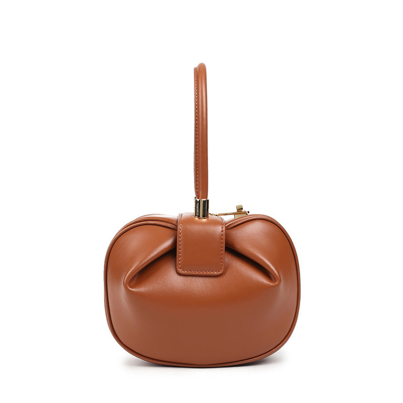 Luxury leather handbag by Shamew featuring a chic dumpling design, perfect for stylish ladies' fashion accessories.