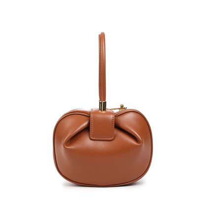 Luxury leather handbag by Shamew featuring a chic dumpling design, perfect for stylish ladies' fashion accessories.