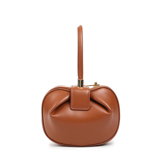 Luxury leather handbag by Shamew featuring a chic dumpling design, perfect for stylish ladies' fashion accessories.