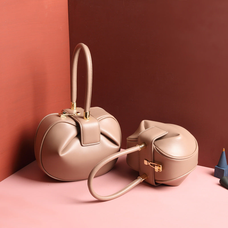 Luxury ladies leather handbag by Shamew featuring a fashionable dumpling design and elegant style.