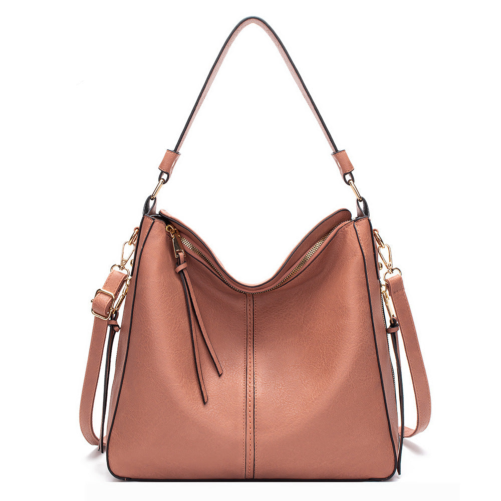 Luxury Shamew shoulder bag, stylish ladies handbag with spacious interior, perfect for shopping and everyday use.