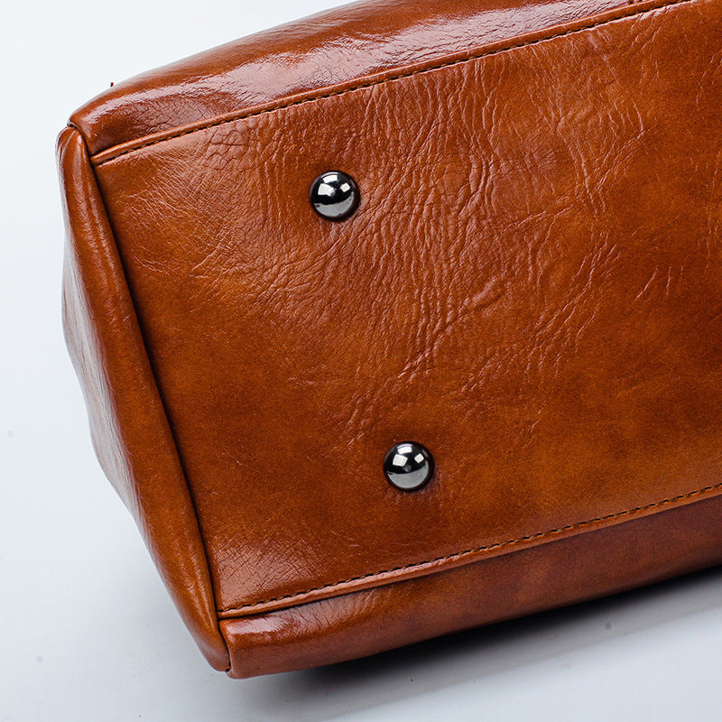 Luxury vintage oil wax leather handbag for women by Shamew, showcasing classic design and high-quality craftsmanship.