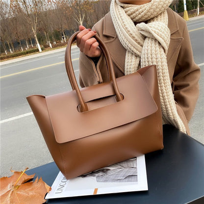 Large capacity simple retro tote bag for ladies by Shamew, luxurious leather handbag with classic design and spacious interior.