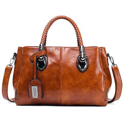Vintage oil wax leather luxury ladies handbag by Shamew with a sleek design and polished finish.