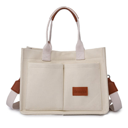 Shamew Everyday Soft Crossbody Shopper for ladies, luxury handbag with a sleek design and adjustable strap, in a neutral color.
